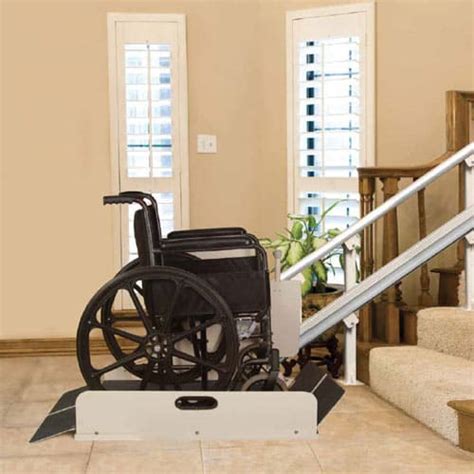 How do you take a wheelchair on stairs?