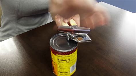 How do you use an American can opener?
