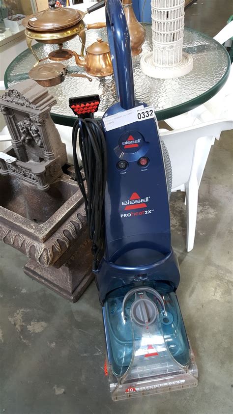 How do you use an old Bissell ProHeat carpet cleaner?