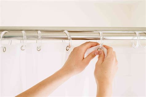 How do you wash curtains without removing hooks?