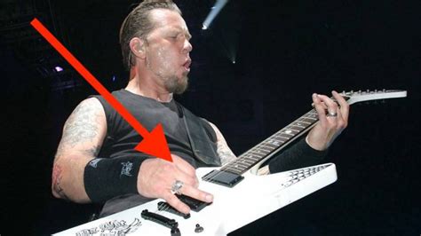 How does James Hetfield hold a pick?