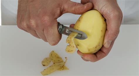 How does Mcdonald's peel potatoes?
