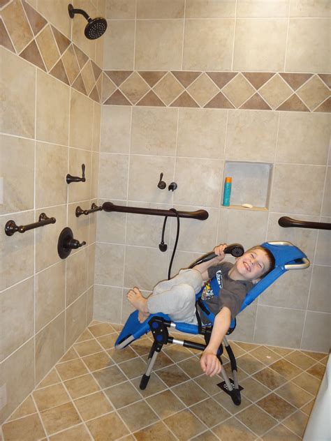 How does a person in a wheelchair take a shower?