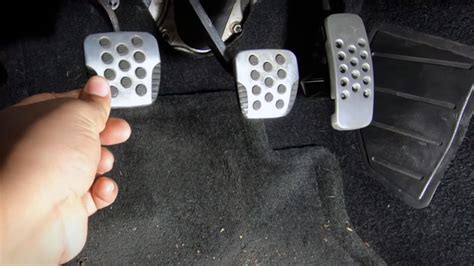 How far down should a clutch pedal go?