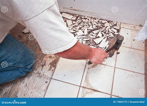 How hard is it to break up tile floor?