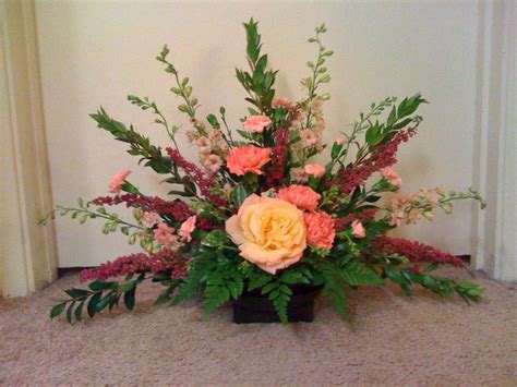 How is balance used in floral design?