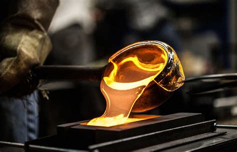 How is glass made by hand?