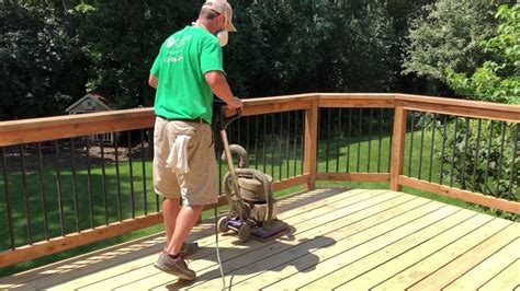 How long after rain can you sand a deck?