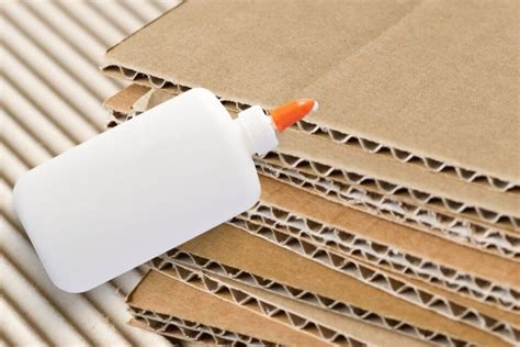 How long does glue take to dry on cardboard?