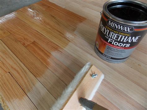 How long should you wait between coats of polyurethane on wood?