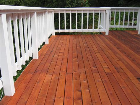 How long to walk on stained deck?