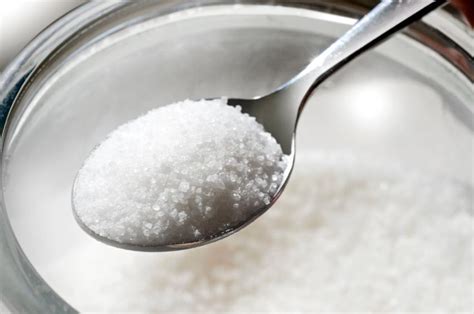 How many grams is a spoon of sugar?