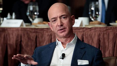 How much does Jeff Bezos have in cash?