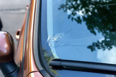 How much pressure does it take to break a windshield?