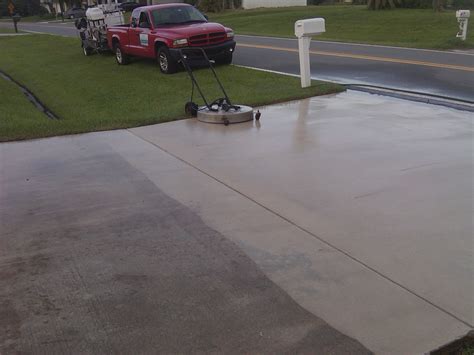 How often should I pressure wash my concrete driveway?