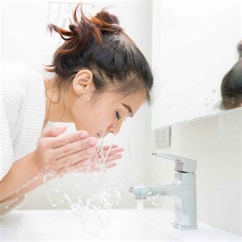 How often should a 70 year old woman wash her face?