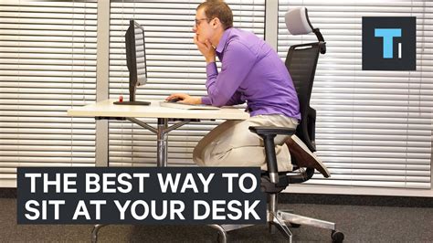 How should I sit at my desk all day?