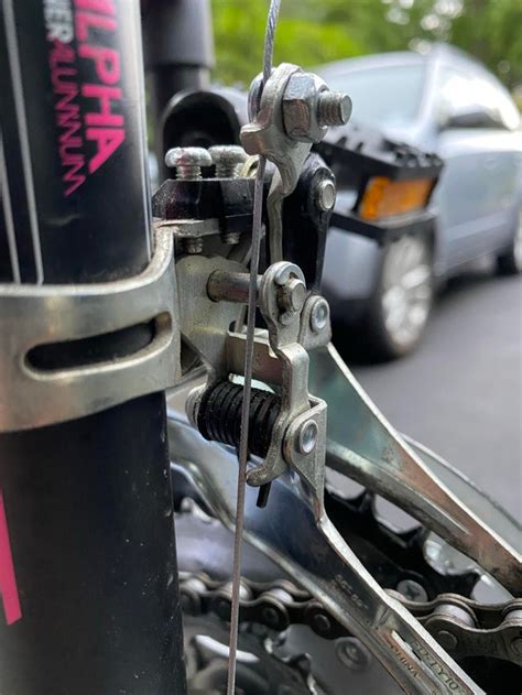 How tight should front derailleur be?