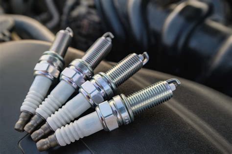 How tight should spark plugs be?