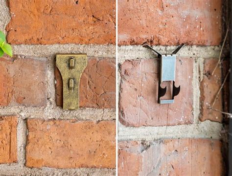 How to attach something to a brick wall without drilling outside?