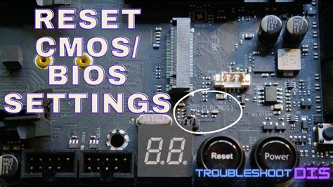 How to reset BIOS with CMOS button?