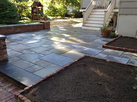 Is a stone patio cheaper than concrete?