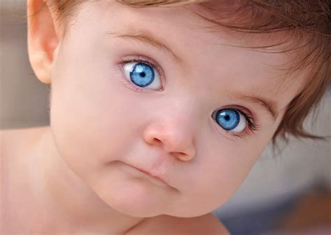 Is brown hair blue eyes rare?