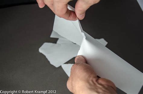 Is cutting of paper a reversible change?