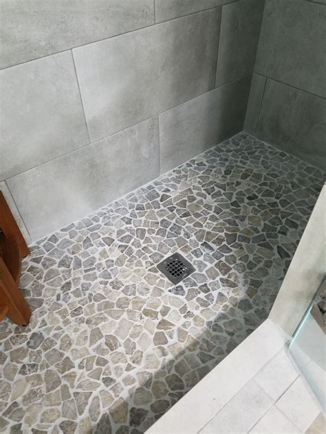 Is honed marble too slippery for shower floor?