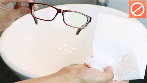 Is it OK to clean glasses with paper towel?