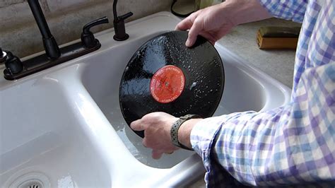 Is it OK to clean vinyl records with water?