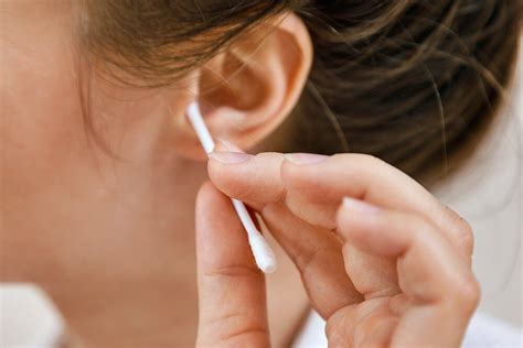 Is it OK to clean your ears with earbuds?