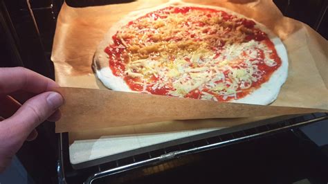 Is it OK to cook pizza on parchment paper?