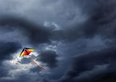 Is it OK to fly a kite in the rain?