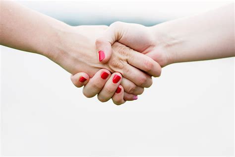 Is it OK to handshake a girl?