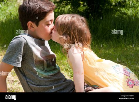 Is it OK to kiss a boy at 11?