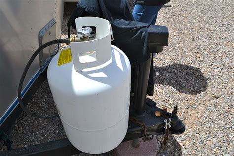 Is it OK to leave propane tank outside in summer?
