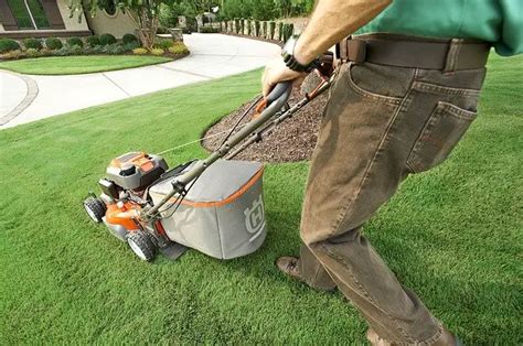 Is it OK to pull a lawn mower backwards?