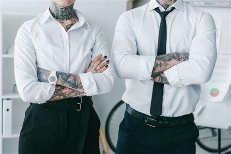 Is it OK to show tattoos at work?