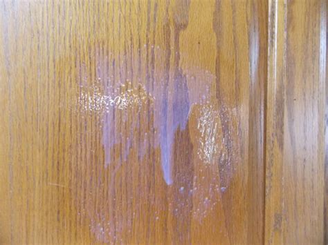 Is it OK to stain wood in high humidity?