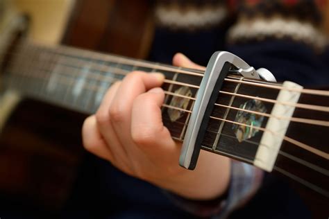 Is it OK to store guitar with capo on?