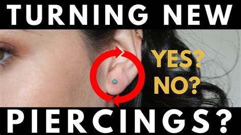 Is it OK to take earrings out early?