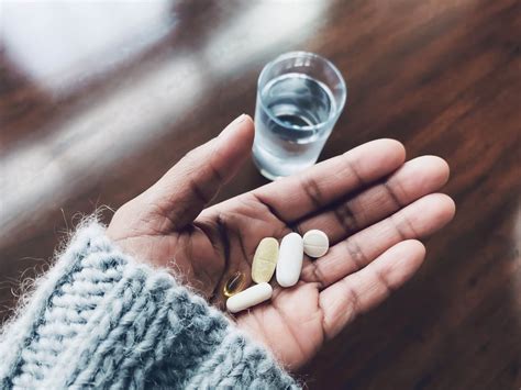 Is it OK to take vitamins with hot water?