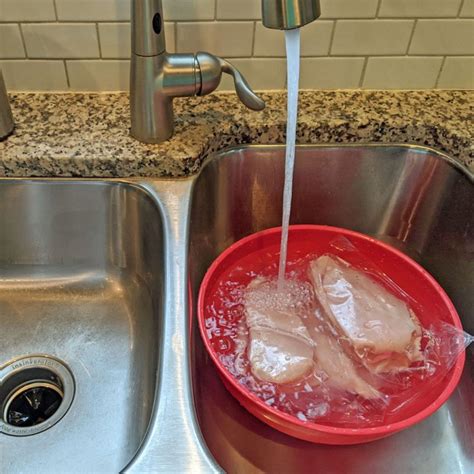 Is it OK to thaw chicken in water?