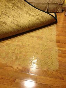 Is it OK to use rubber backed rugs on vinyl plank flooring?