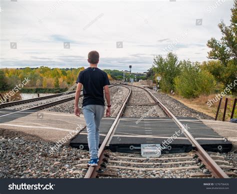 Is it OK to walk on train tracks?