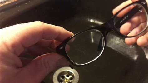 Is it OK to wash eyeglasses with soap and water?