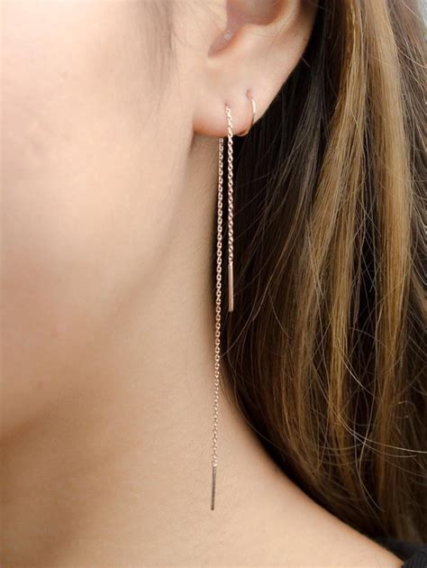 Is it OK to wear long earrings?