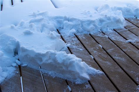 Is it bad to leave snow on a wooden deck?