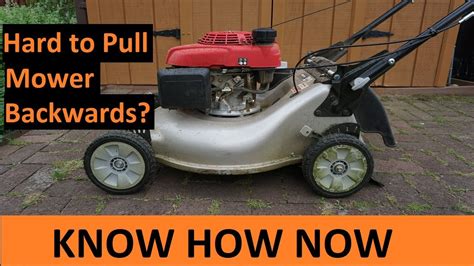 Is it bad to pull a lawn mower backwards?